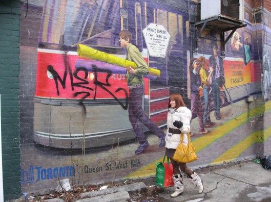Me, walkng alongside Queen W mural