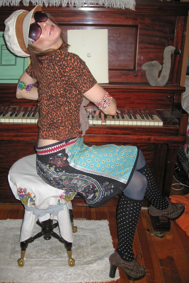 Playing Piano in Bowie Skirt