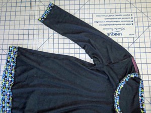 Garment Inside:  overlocked seams and ribbon stay tape added to shoulder seams.